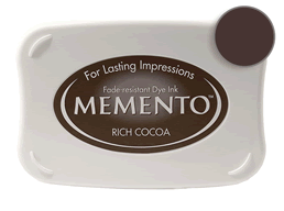 Buy a Memento Rich Cocoa Stamp Pad! This is fast drying on most papers including glossy finishes.